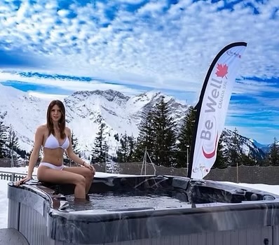 Be Well Canada Spa installed on a snowy alpine terrace with mountain views